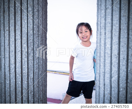 Adorable little girl playing peekaboo Adorable little girl playing peekaboo 27405703