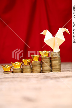 Chicken and gold ingots on stacked coins Chicken and gold ingots on stacked coins 27408860
