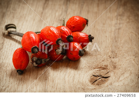 Hawthorn on wooden table background Hawthorn on wooden table background 27409658