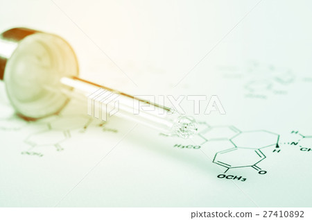 Laboratory glass Pipette, Chemical formula paper. Laboratory glass Pipette, Chemical formula paper. 27410892
