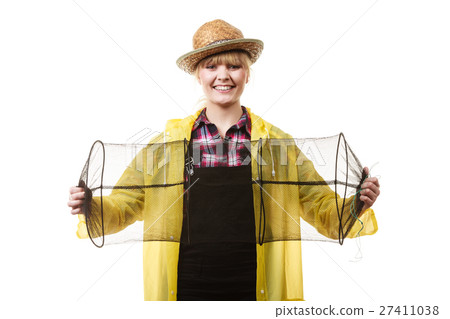 Happy woman holding empty fishing keepnet Happy woman holding empty fishing keepnet 27411038
