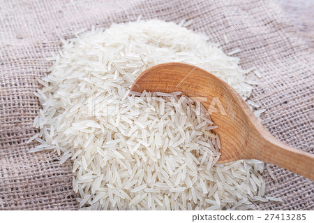 uncooked rice is scattered 27413285