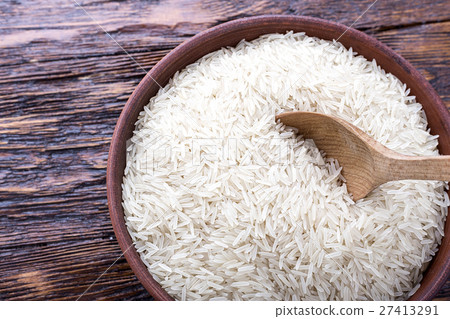 rice on a wooden background rice on a wooden background 27413291