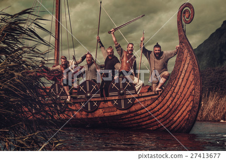 Group of vikings are floating on the sea on 27413677