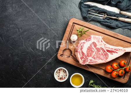 Raw tomahawk beef steak 27414010