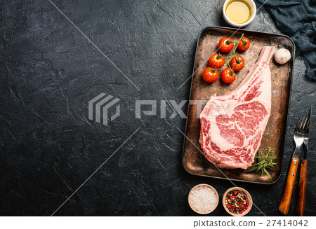 Raw tomahawk beef steak 27414042