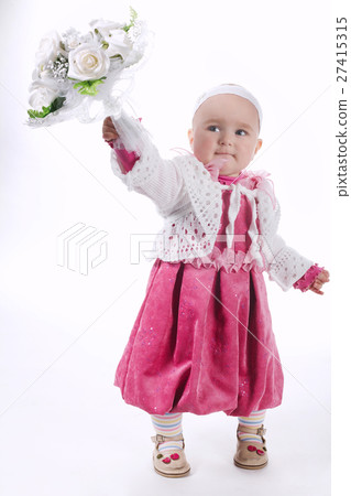beautiful little girl with bouquet on white 27415315