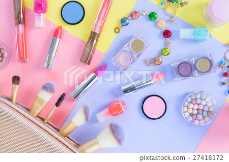 Colorful make up flat lay scene Colorful make up flat lay scene 27418172