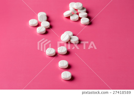Heap of round white pills Heap of round white pills 27418589