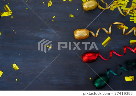 Carnaval decorations on dark wooden background Carnaval decorations on dark wooden background 27419393