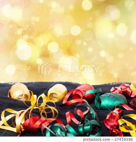 Carnaval decorations on dark wooden background Carnaval decorations on dark wooden background 27419396