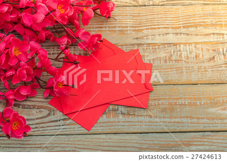 Chinese New Year decoration on wood wall . Chinese New Year decoration on wood wall . 27424613