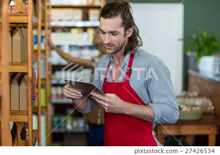 Male staff using a digital tablet 27426534