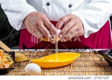 cracking an egg cracking an egg 27427187