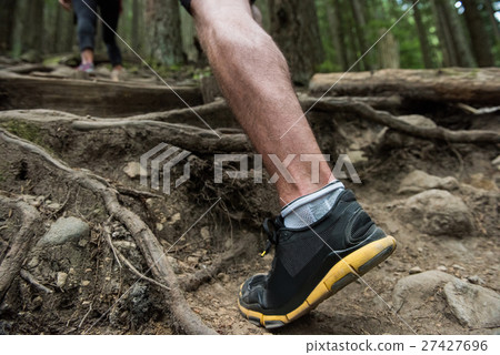Low section of hiker hiking in countryside 27427696