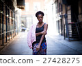 Portrait of young black woman on city street 27428275
