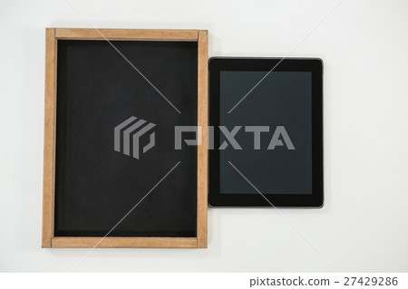 Digital tablet and slate on white background Digital tablet and slate on white background 27429286