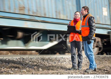Workers at a railway 27430478