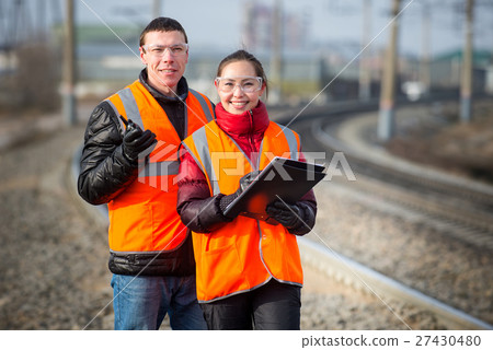 Railroad workers doing their job Railroad workers doing their job 27430480