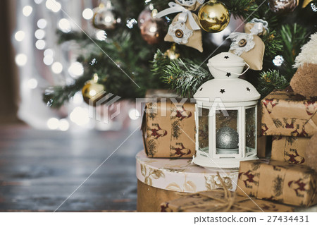 Gifts for the new year under the tree 4616. 27434431