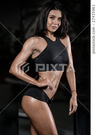 sexy brunette fitness wet woman after workout gym 27435961