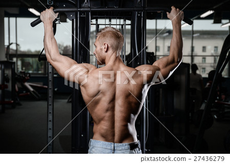 Strong and handsome athletic young man muscles abs Strong and handsome athletic young man muscles abs 27436279