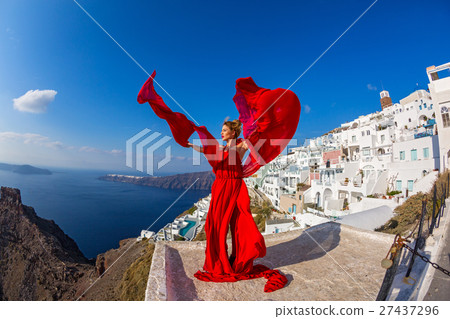 Woman in a beautiful red dress 27437296