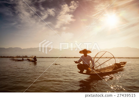 Traditional Burmese fisherman at Inle lake Traditional Burmese fisherman at Inle lake 27439515