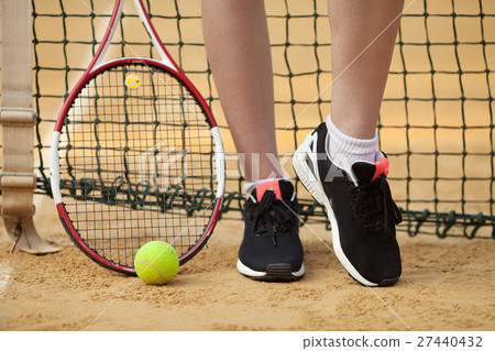 Clay tennis court with tennis player legs,ball Clay tennis court with tennis player legs,ball 27440432