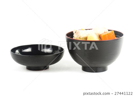 Chicken wings soup in wooden cup 27441122