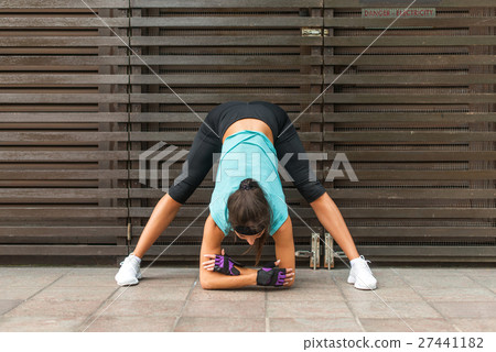 Sporty beautiful young woman practicing yoga doing 27441182