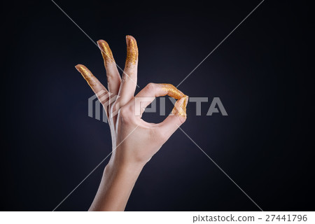 Pleasant slim woman showing ok 27441796