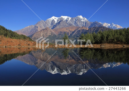 Nilgiri range mirroring in Sekong lake Nilgiri range mirroring in Sekong lake 27443266