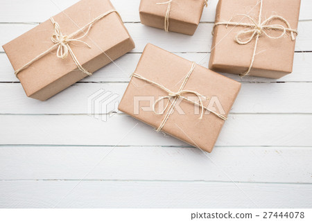 Christmas style rustic brown paper package tied up 27444078