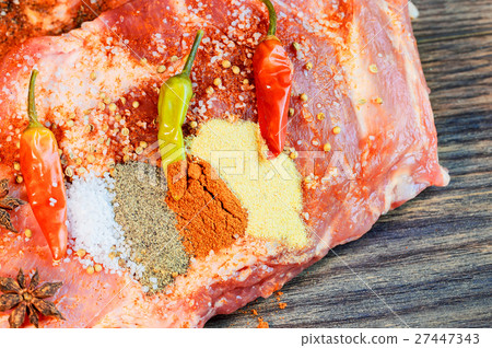 Fresh pork ribs, meat marinated and prepared  27447343