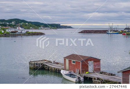 Little red shed & boat on a dock in Twillingate. 27447446