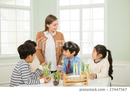 Young Students In Biology Class With A Female Teacher 27447567