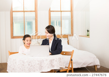 Young Student And A Female Teacher 27447678