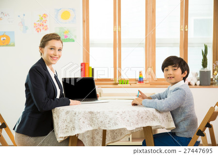 Young Student Learning English With A Foreign Female Teacher Young Student Learning English With A Foreign Female Teacher 27447695
