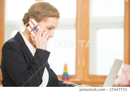 Foreign Female Teacher Talking On The Phone 27447733