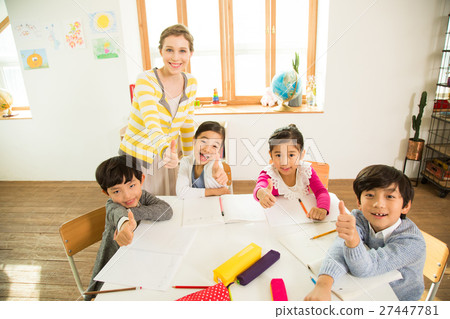 Young Students Learning With A Foreign Female Teacher 27447781