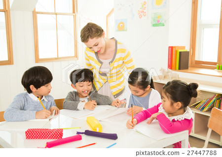 Young Students Learning With A Foreign Female Teacher 27447788