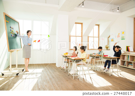Young Students In Math Class With A Female Teacher 27448017