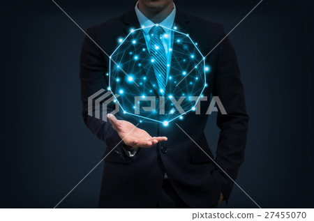 Businessman hand holding the Futuristic Technology connection shape over dark background, business technology and Social Network concept Businessman hand holding the Futuristic Technology connection shape over dark background, business technology and Social Network concept 27455070