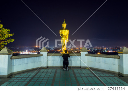 Buddha standing on a mountain at twilight time at Wat Phra That Khao Noi, Nan Province, Thailand, public domain 27455534