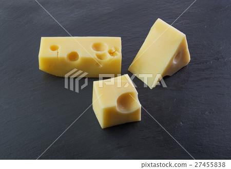 Three pieces of cheese 27455838
