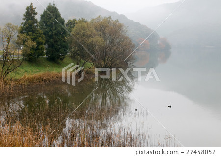 Lakeside smoky in fog Lakeside smoky in fog 27458052