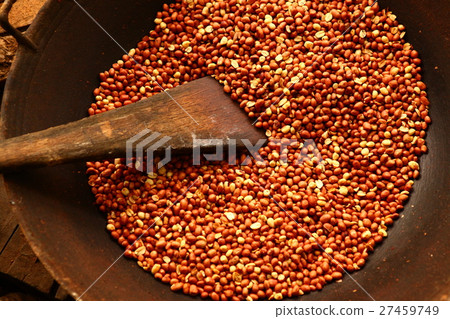 roasted peanuts with spatula 27459749