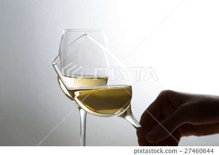 Women's hand with white wine Women's hand with white wine 27460644