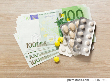 One hundred euro banknotes and pills One hundred euro banknotes and pills 27461960